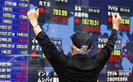 Nikkei down but up for the year