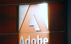 Adobe Stock Downgraded: Complex AI Narrative Impacts Valuation