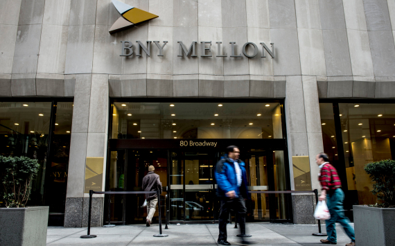 BNY Mellon's quarterly profit halved